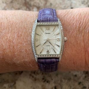 Ladies dress watch with 5 interchangeable bands.